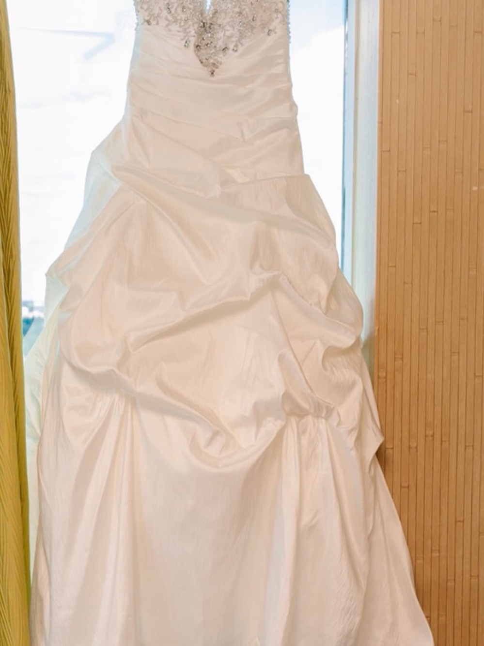 Elegant White Strapless Bridal Gown with Beaded Bodice